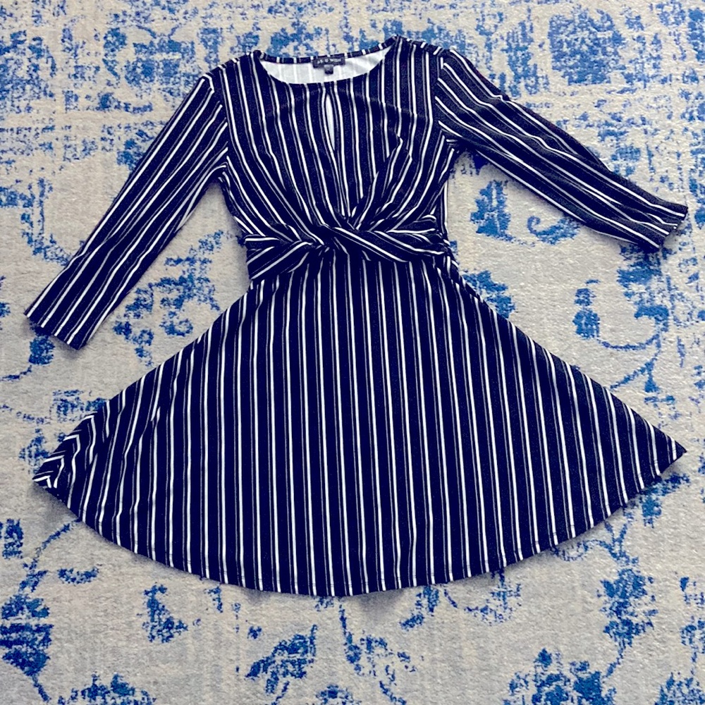 Black dress with white small strips